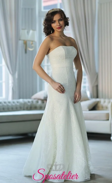 Gli abiti da sposa per donne basse dovrebbero avere come requisito principale quello di slanciare la figura e far guadagnare qualche centimetro in più.