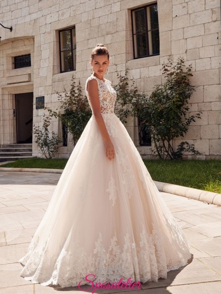 abito da sposa vendita online con ricami di pizzo e gonna colorata