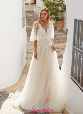 Deva- abiti da sposa con mantellina elegante di pizzo