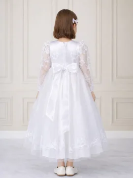 Retro vestito battesimo bimba in pizzo ricamato con maniche lunghe e dettaglio fiocco scenografico in seta, alta qualità sartoriale Sposatelier