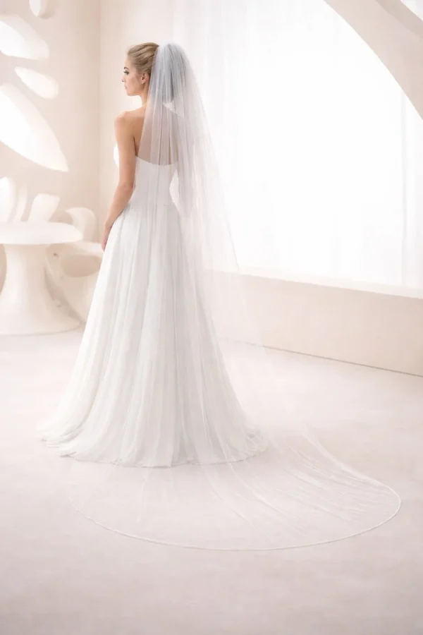 velo sposa lungo tulle elegante effetto cattedrale fluido