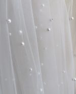 dettaglio velo sposa con perle