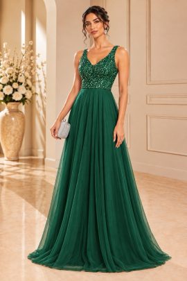 Abito da cerimonia verde smeraldo con corpetto ricamato e gonna lunga in tulle