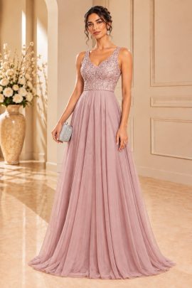 Abito da cerimonia rosa cipria con corpetto gioiello e gonna lunga in tulle