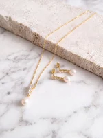 Collana sposa dorata con perla pendente e zirconi cubici