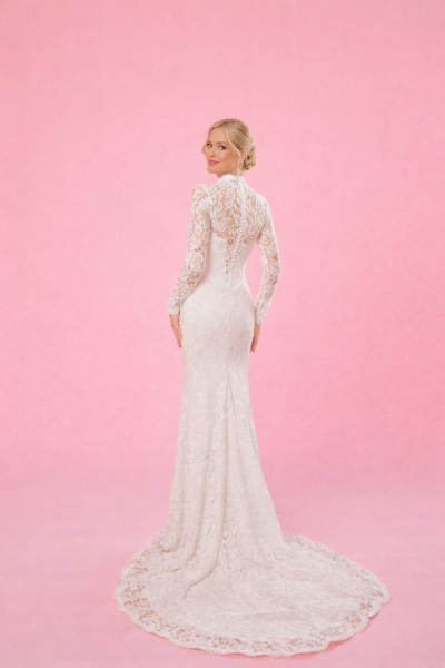 abito da sposa pizzo maniche lunghe schiena trasparente